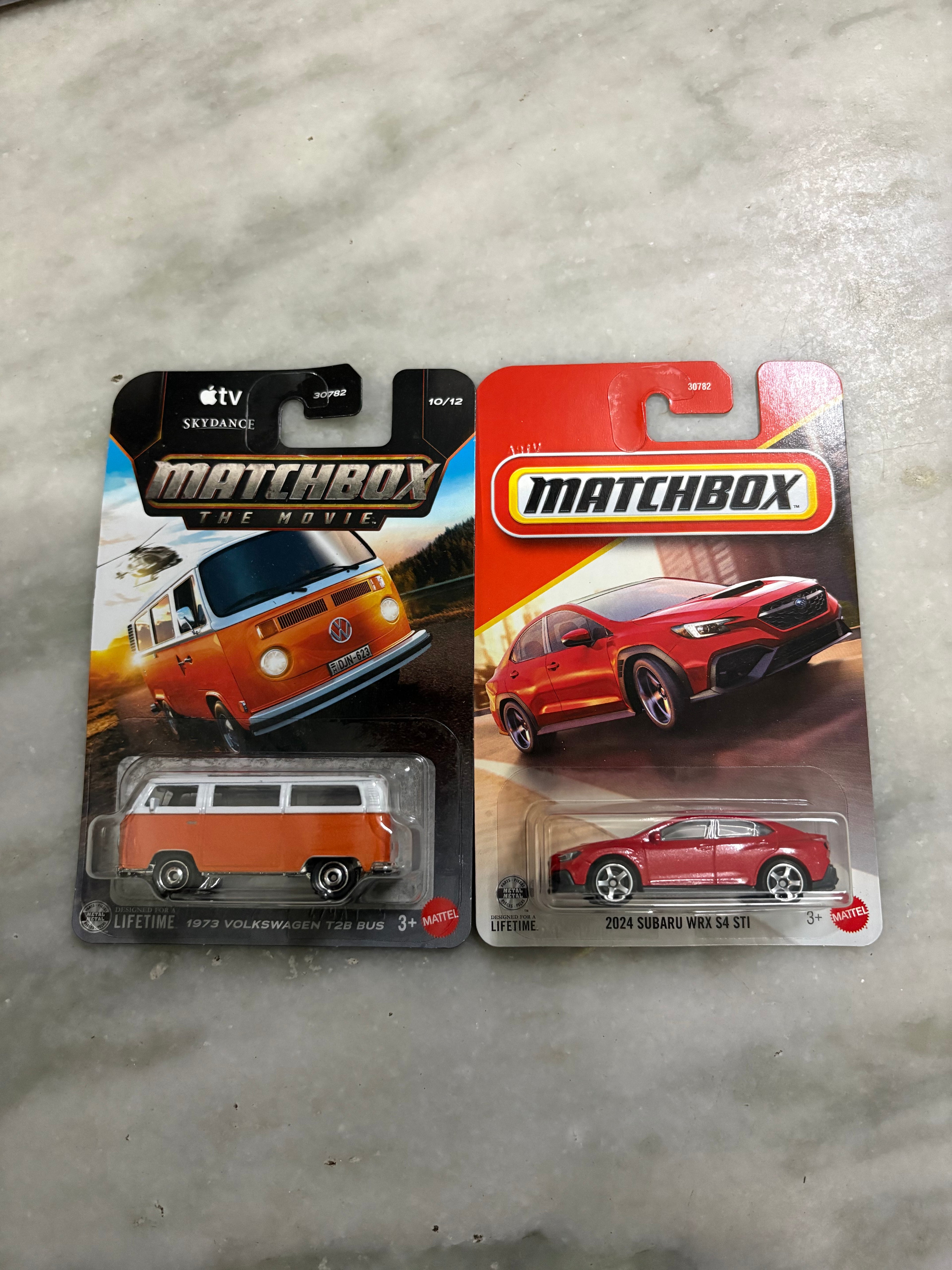 1974 Volkswagen T2B Bus and 2024 Subaru WRX S4 STI